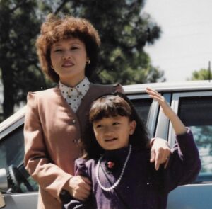 Young Christine with her mom