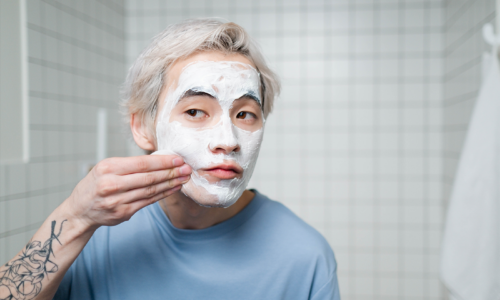 Man applying face mask
