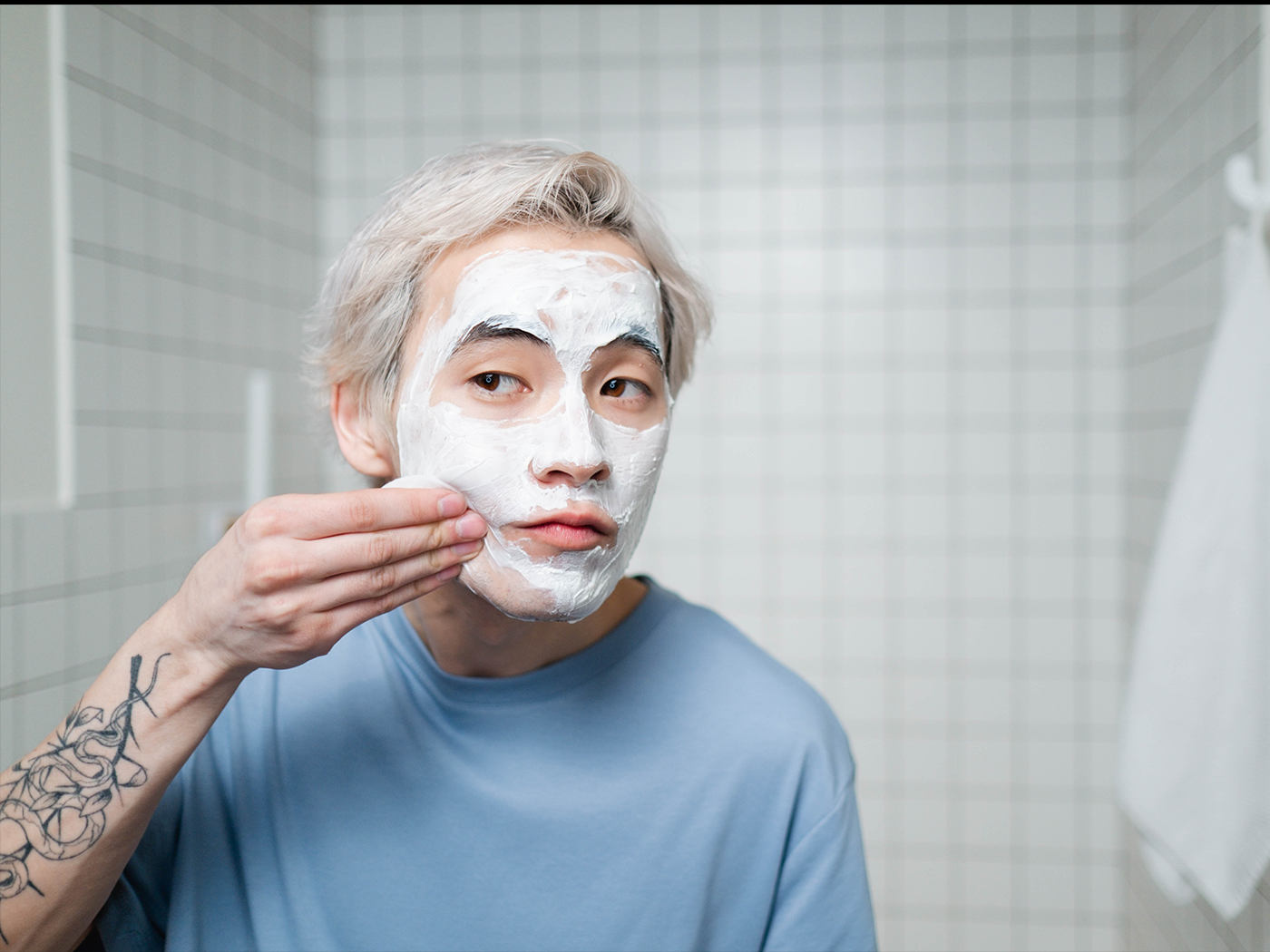 Man applying face mask