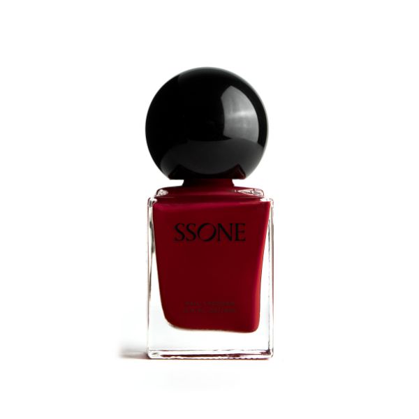 Bottle of Ssone Nail Lacquer in a deep red