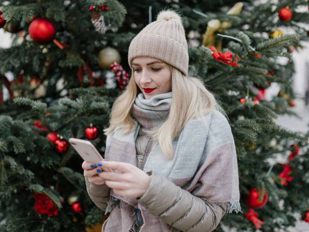 Photo of a woman holiday shopping on TikTok shop