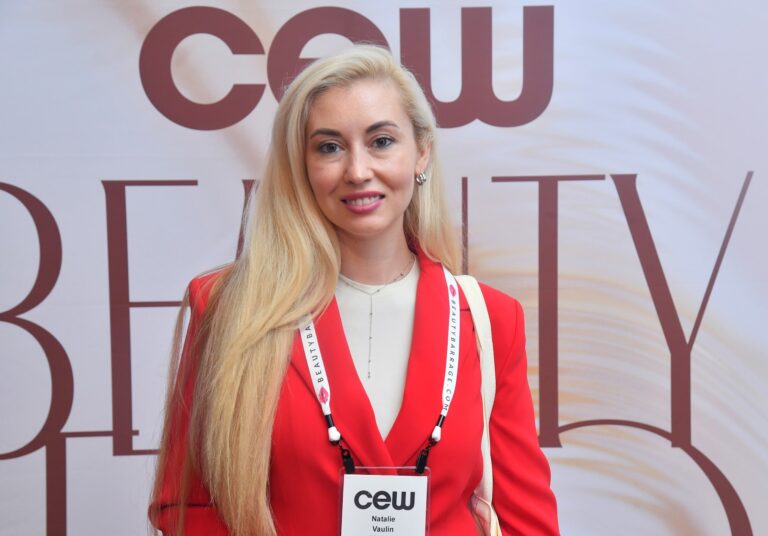 Natalie Vaulin at the CEW Beauty Expo backdrop